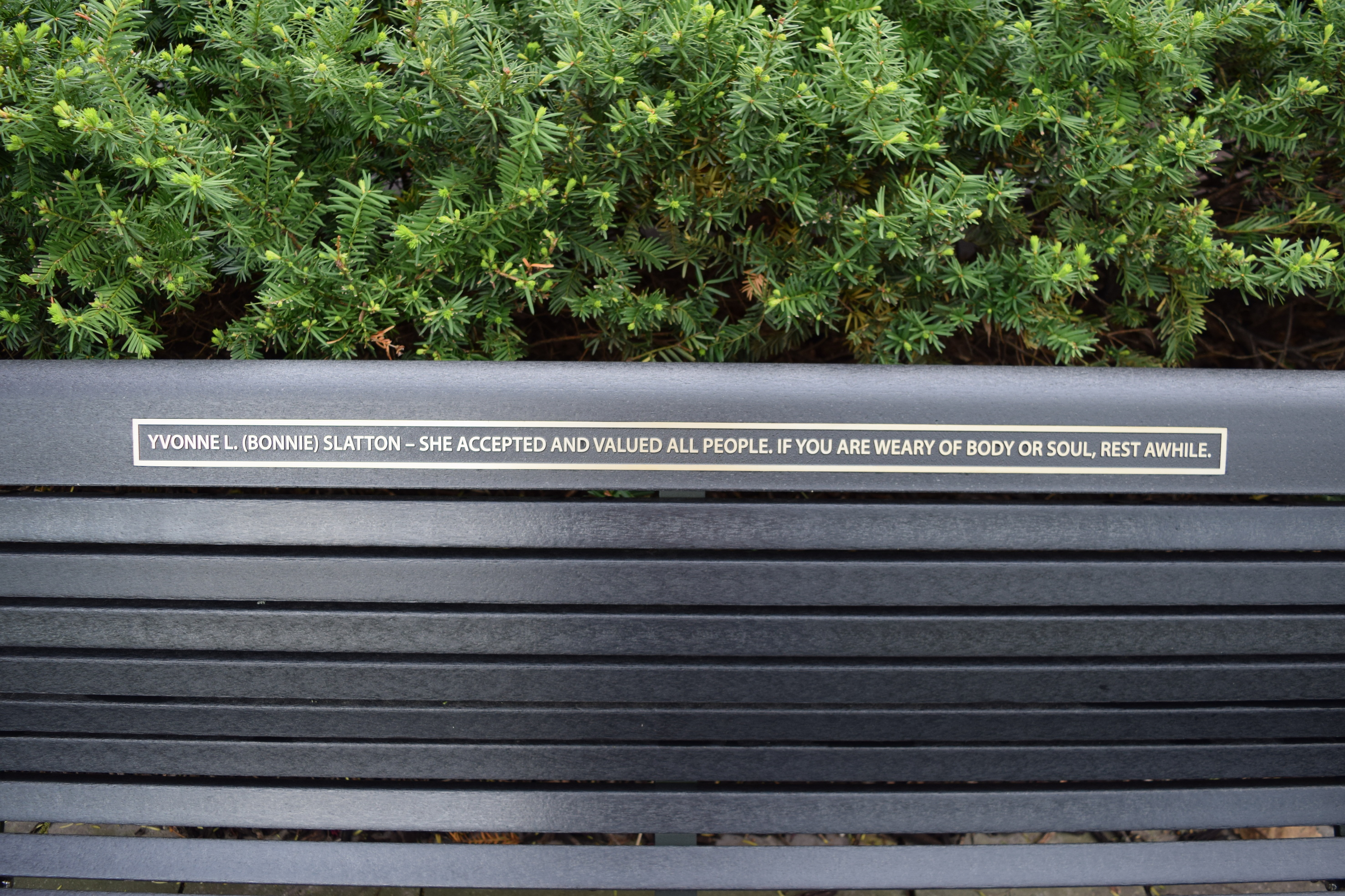 This bench at Iowa Lions Memorial & Healing Garden at University of Iowa dedicated to Yvonne "Bonnie" Slatton.