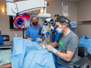 Dr. Ward performing eye surgery