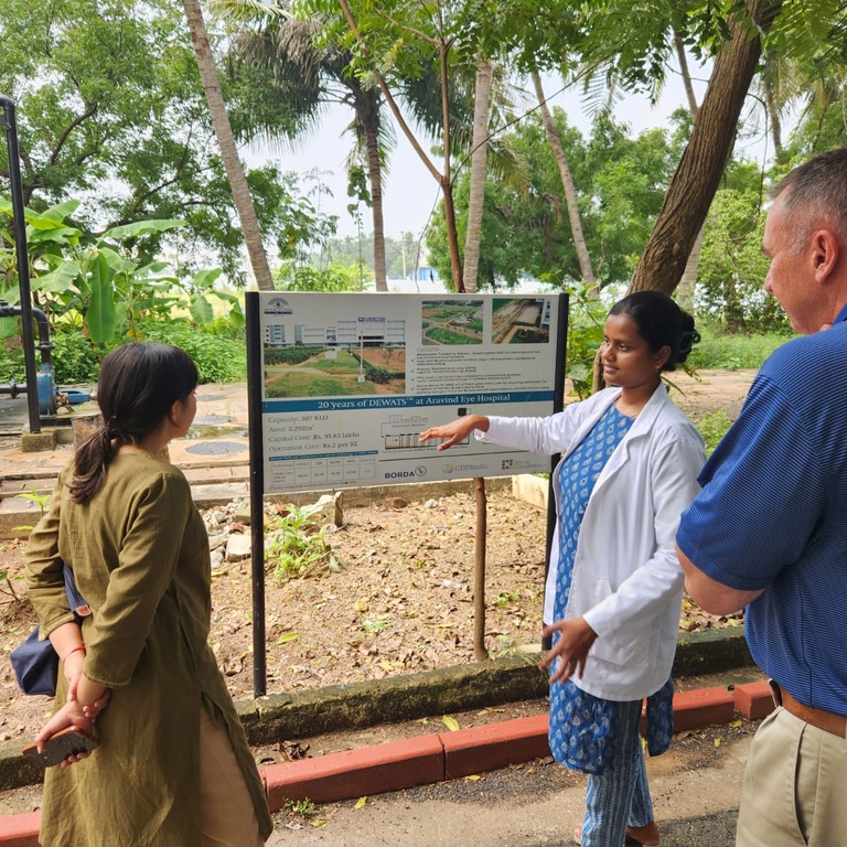 Simran Sarin, Greg Schmidt, learning about wastewater recycling at Aravind Eye Hospital in Pondicherry, India.