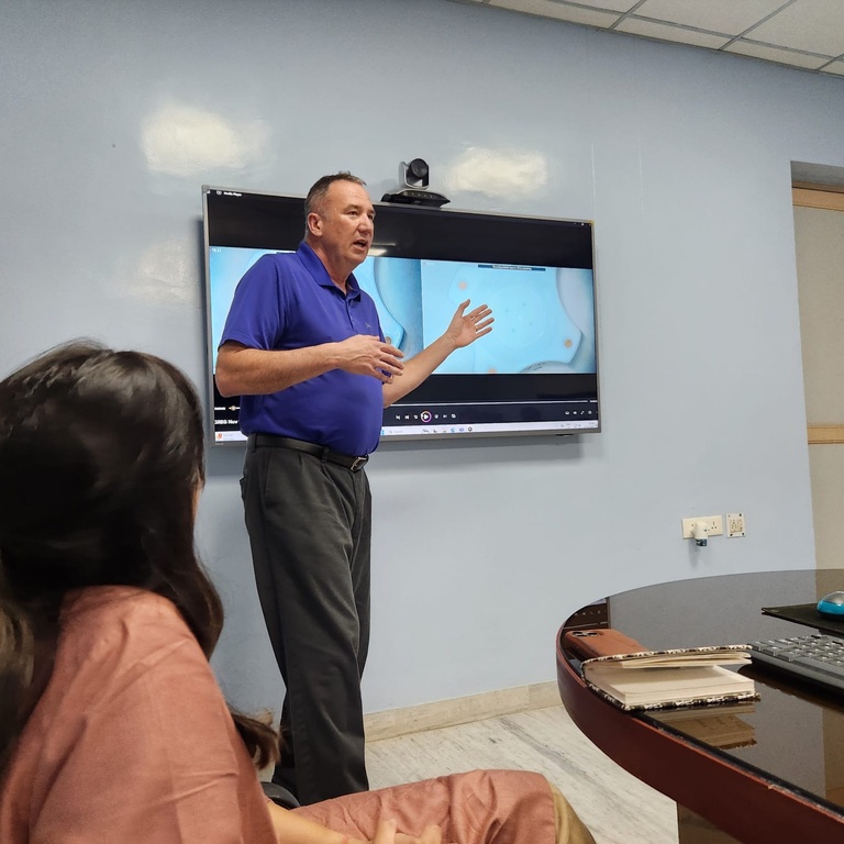 Greg Schmidt speaking to an audience at Aravind Eye Hospital in Pondicherry, India. (