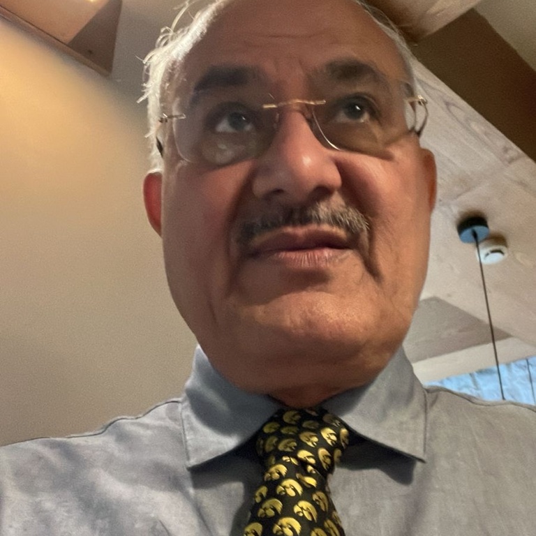 Dr. Virender Singh Sangwan with his Hawkeye tie.