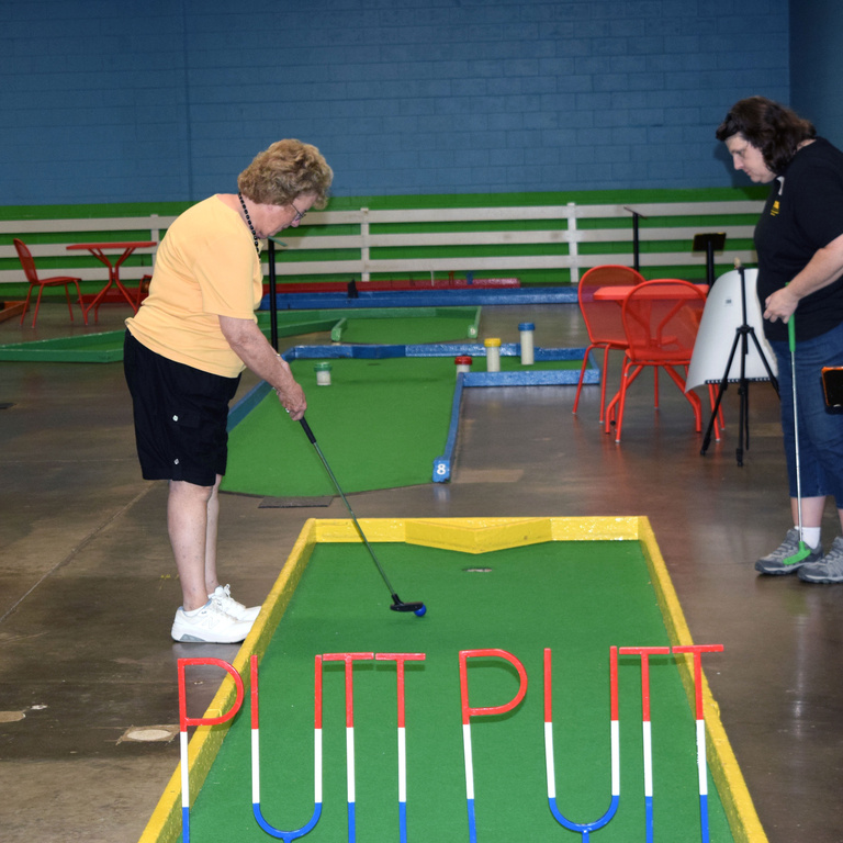 Janet Driscoll playing putt putt