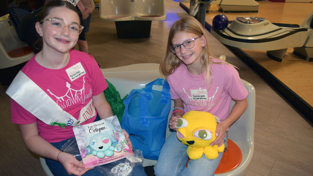 Mackie Malli and Charlotte Harris at the Strikes for Sight Event.